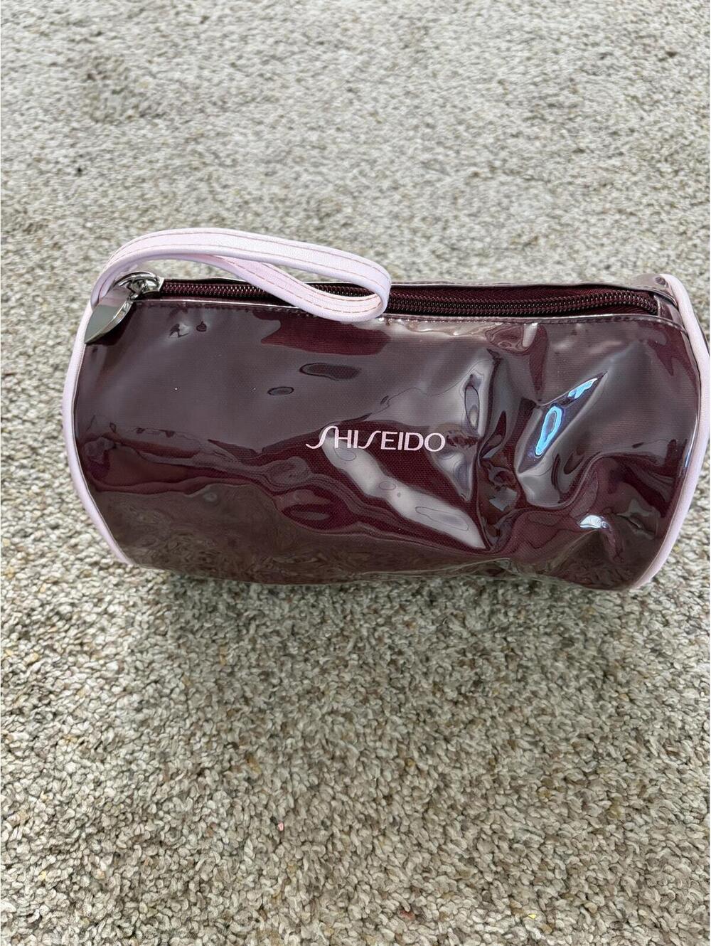 Shiseido cosmetic bag with wristlet strap